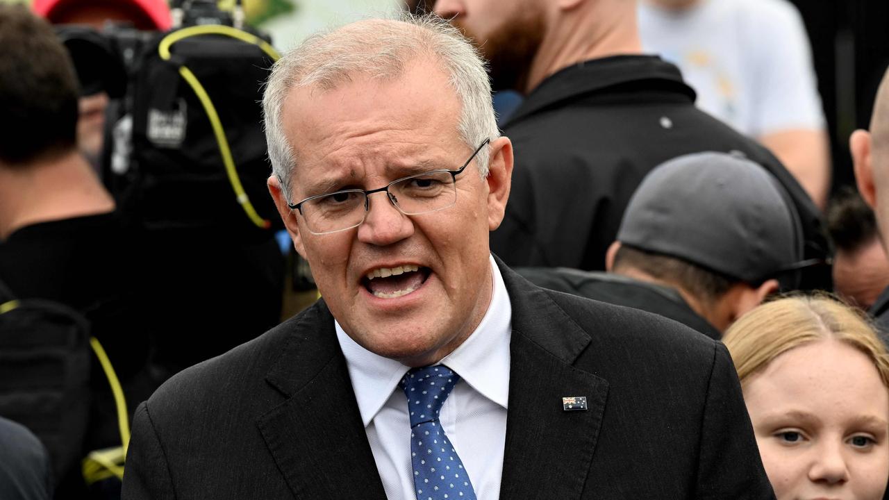 Scott Morrison spoke to the press about the boat intercept on election day. Picture: Saeed Khan / AFP