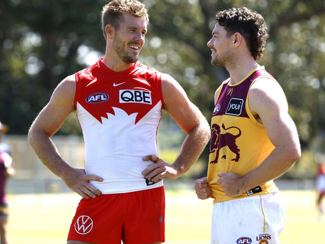 Sydney's Luke Parker  with Brisbane's Lachie Neale at full time during an AFL practice match between the Sydney Swans and Brisbane Lions at Lakeside Oval, Sydney on February 24, 2023. Photo by Phil Hillyard(Image Supplied for Editorial Use only - **NO ON SALES** - Â©Phil Hillyard )