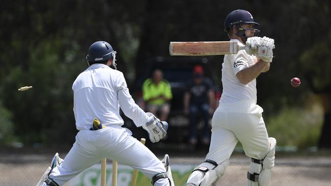 Joshua Adams is bowled by Mackenzie Stanley.