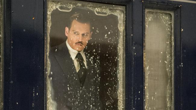 Johnny Depp as Ratchett in a scene from Murder on the Orient Express.