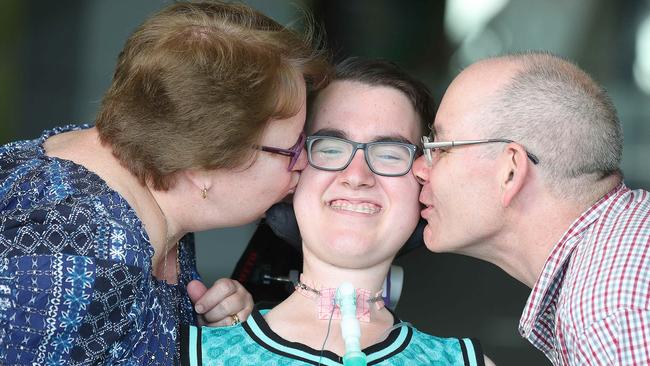 Samuel Thorne, 13 with his parents Jane and Craig at the Queensland Children’s Hospital . Picture: Annette Dew