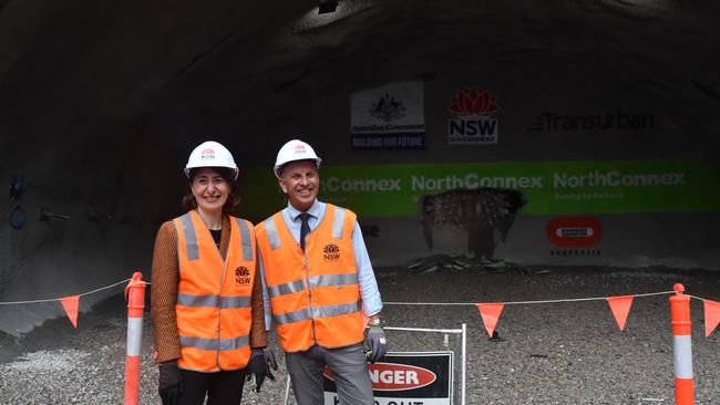 Supplied pictures of NSW Premier Gladys Berejiklian and Minister Transport and Infrastructure Andrew Constance at the final breakthrough of the NorthConnex tunnel.