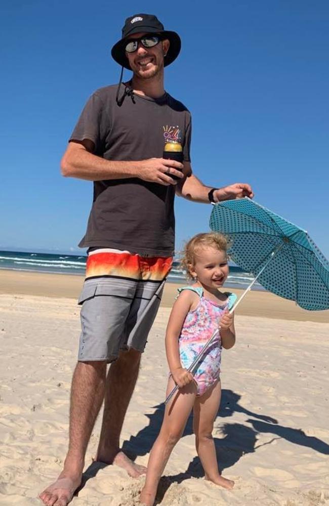 Kieren Dick and his young daughter Charlotte, pictured at their campsite in Double Island Point. Mr Dick said he would never return to the popular camping spot after he was surrounded by inconsiderate campers in October. Photo: Contributed