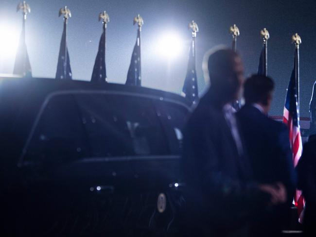 (FILES) In this file photo taken on September 26, 2020 Secret service agents wait by "The Beast" as US President Donald Trump speaks during a "Make America Great Again" campaign rally at Harrisburg international airport in Middletown, Pensylvania. - The US Secret Service, the law enforcement agency that protects the president, deleted agents' text messages sent during the January 6 Capitol riot, a government watchdog said in a letter published Thursday. Joseph Cuffari, the inspector general of the Department of Homeland Security, told Congress in the letter dated Wednesday that his office has had difficulties obtaining records from the Secret Service from January 5 and 6, 2021. (Photo by Brendan Smialowski / AFP)