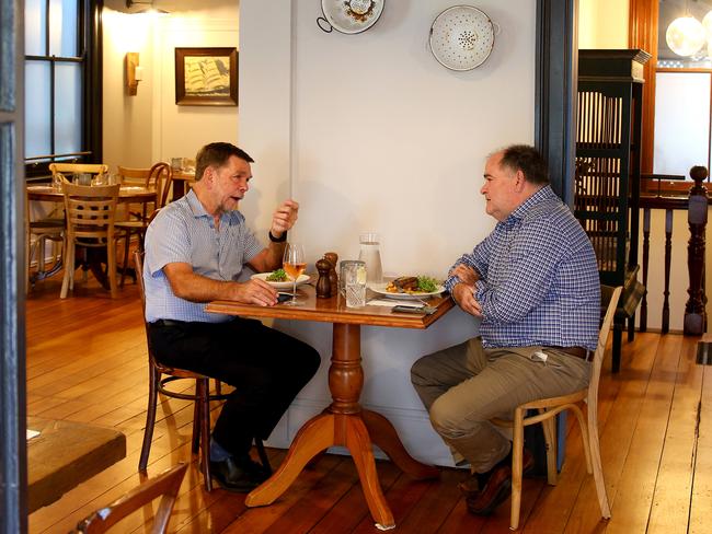 Founder and Managing Director of the Flight Centre Graham Skroo Turner pictured dining with Michael Madigan. Picture David Clark