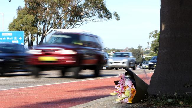 Flowers have been left as a tribute for a61-year-old woman, who was hit by a truck on Pittwater Rd, Brookvale yesterday. Picture: Carly Earl