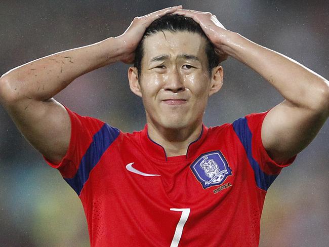 South Korea's Son Heung Min reacts after missing a goal shot during the AFC Asian Cup semifinal soccer match between South Korea and Iraq in Sydney, Australia, Monday, Jan. 26, 2015. (AP Photo/Quentin Jones)