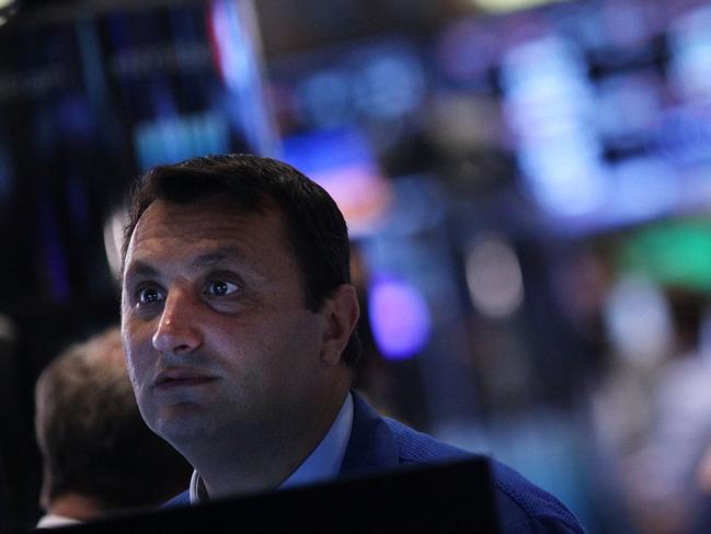 NEW YORK CITY, NY - AUGUST 06: A trader works on the floor of the New York Stock Exchange (NYSE) on August 06, 2015 in New York City. The Dow Jones industrial average fell 120 points today as Wall Street braces for Friday's employment report which will give a more solid indication of the timing of a rate hike by the Federal Reserve. Spencer platt/Getty Images/AFP == FOR NEWSPAPERS, INTERNET, TELCOS & TELEVISION USE ONLY ==