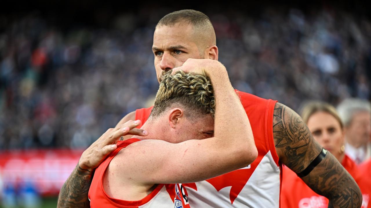 Chad Warner is consoled by teammate Lance Franklin after Saturday’s grand final loss. Picture: Daniel Carson/AFL Photos