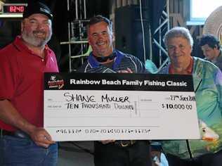 GRAND WINNER: Nathan Kropp (general manager, Toyota) and Rick Modin with Rainbow Beach Family Fishing Classic $10,000 prize winner Shane Muller. Picture: Contributed