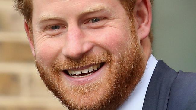 LONDON, ENGLAND - DECEMBER 14: Prince Harry waves as he leaves after a visit to Mildmay, a dedicated HIV hospital, to mark the opening of the new purpose built facility at Mildmay Hospital on December 14, 2015 in London, England. (Photo by Chris Jackson/Getty Images)