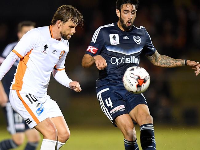 BRISBANE, AUSTRALIA - AUGUST 09:  Rhys Williams of the Victory gets the ball away during the FFA Cup round of 32 match between the Brisbane Roar and the Melbourne Victory at Perry Park on August 9, 2017 in Brisbane, Australia.  (Photo by Bradley Kanaris/Getty Images)