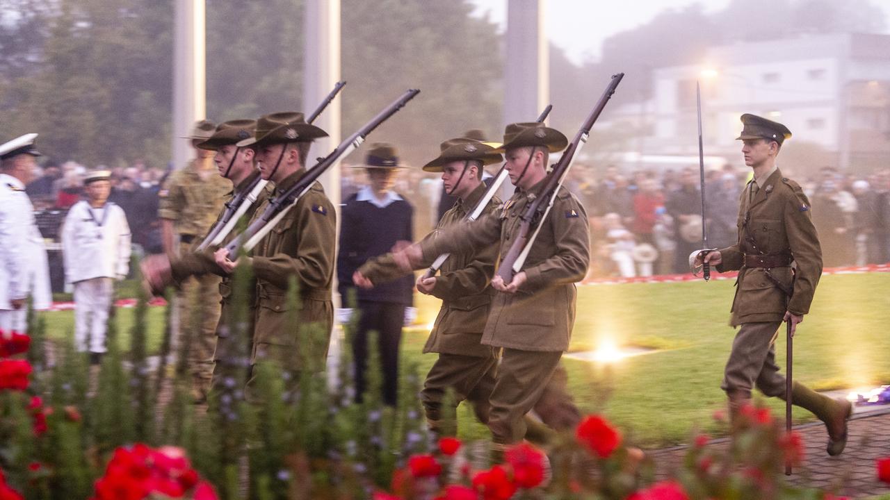 Toowoomba Grammar School students catafalque party retires during the Anzac Day dawn service, Monday, April 25, 2022. Picture: Kevin Farmer