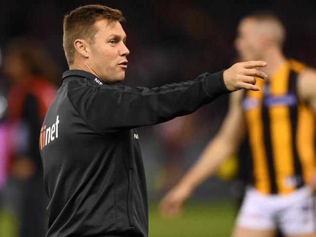 Hawks assistant coach Sam Mitchell is seen the Round 13 AFL match between the Essendon Bombers and the Hawthorn Hawks at Marvel Stadium in Melbourne, Friday, June 14, 2019. (AAP Image/Julian Smith) NO ARCHIVING, EDITORIAL USE ONLY