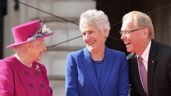 Queen Elizabeth II speaking with Louise Martin, President of the Commonwealth Games Federation and Peter Beattie. Mr Beattie says he’s keen to get both the Queen and Prince Charles to visit