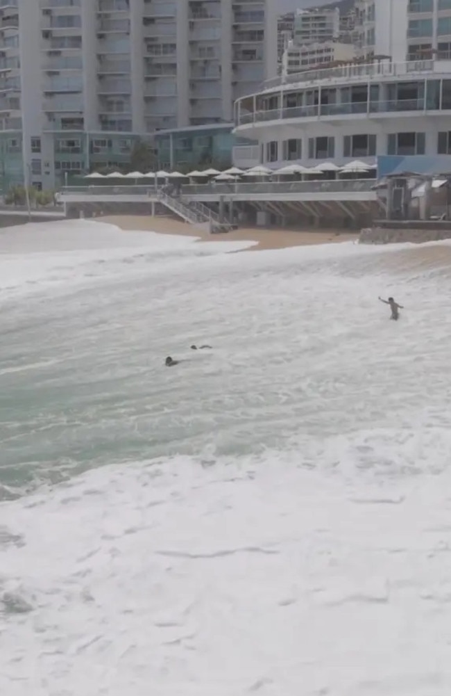 A harrowing scene on a Mexican beach shows swimmers becoming swamped by a huge wave in the wake of Tropical Storm Alvin. Picture: adolfokahan via Storyful
