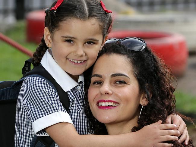 Back to school story about separation anxiety in children and parents. Maria Ligerakis with her daughter Alexandra aged 6 at Kool Kids early learning centre.Mill Park, Melbourne.January 23, 2020. Picture : George Salpigtidis