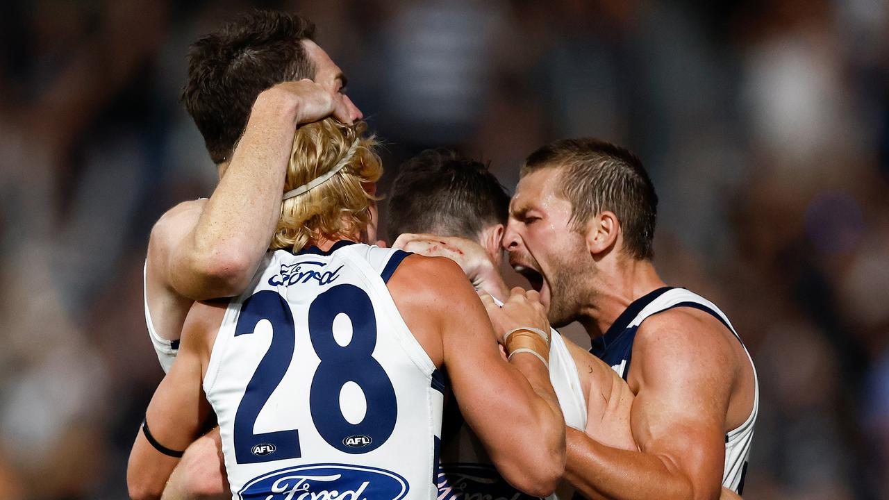 GEELONG, AUSTRALIA - MARCH 16: Patrick Dangerfield of the Cats (centre) celebrates with teammates after a late goal during the 2024 AFL Round 01 match between the Geelong Cats and the St Kilda Saints at GMHBA Stadium on March 16, 2024 in Geelong, Australia. (Photo by Michael Willson/AFL Photos via Getty Images)
