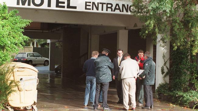 Detectives out the front of the motel.