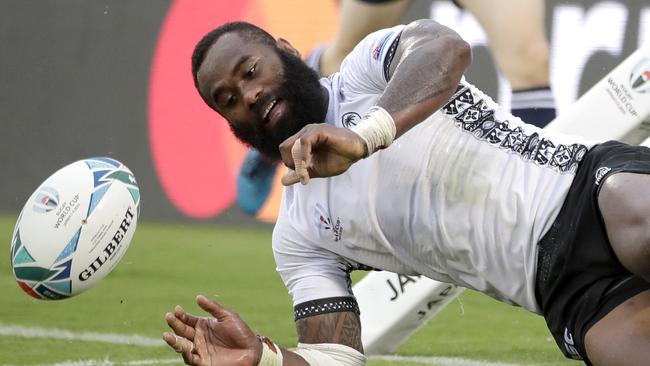 Fiji's Semi Radradra reacts after scoring a try during the Rugby World Cup Pool D game at Hanazono Rugby Stadium between Georgia and Fiji in Osaka, Japan, Thursday, Oct. 3, 2019. (AP Photo/Jae C. Hong)