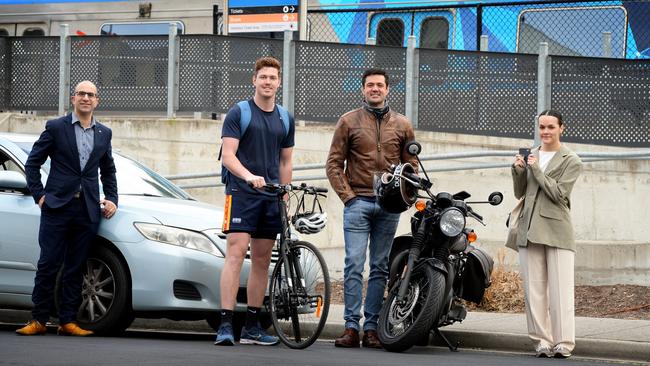 Matthew Younan (car), Nilsson Jones (cycle), Dane Hitchins (motorbike) and Daisi Henry (train) at Altona railway station. Picture: Andrew Henshaw