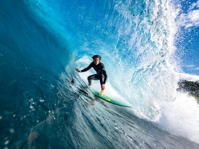 EMBARGO FOR TWAM, 03 MAY 2025. FEE MAY APPLY. ONE TIME USE. Surfer in a barrel. Photo: Tony Harrington