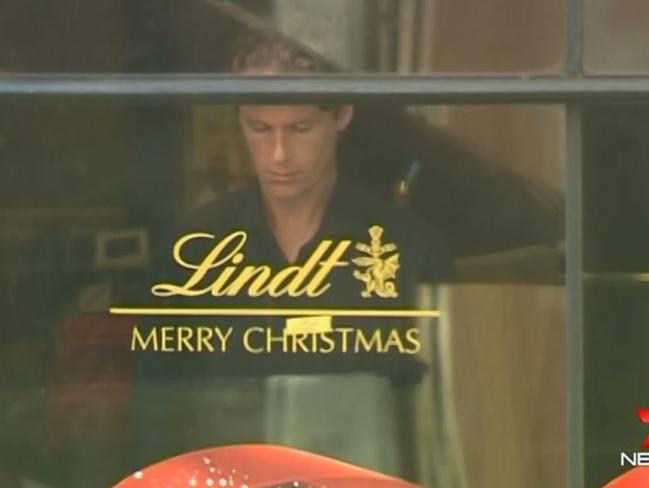 Lindt Cafe siege victim Tori Johnson at the window of the cafe. Hours later, he was shot dead by Monis. Picture: Channel 7