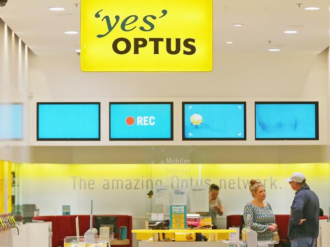 MELBOURNE, AUSTRALIA - APRIL 30: A 'Yes Optus' sign hangs outside of an Optus store on April 30, 2014 in Melbourne, Australia. Optus today announced it would cut 350 jobs in the next four weeks. Optus is Australia's second largest telecommunications company. (Photo by Scott Barbour/Getty Images)