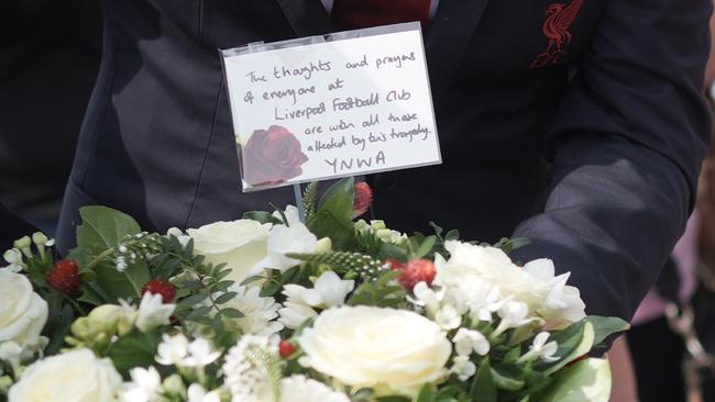 A floral tribute from Liverpool Football Club to the child victims of the knife attack. Picture: Getty Images.