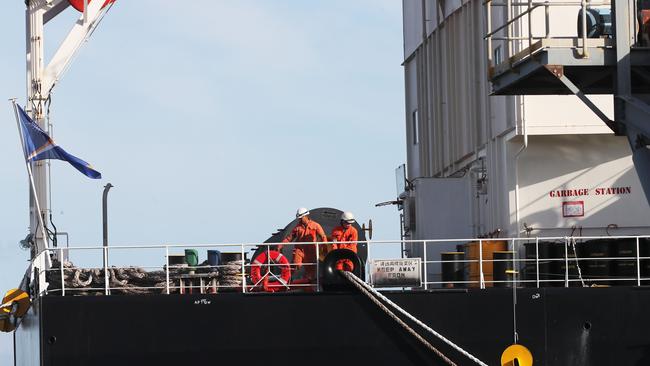 Around midnight on Sunday, port officials saw an inflatable rubber dinghy and a five-metre aluminium Quintrex runabout with a green stripe seen near floating near the ship under the cover of darkness. Picture: Peter Lorimer