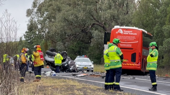 Man dead, dozens injured after car, bus crash on Mitchell Highway near ...