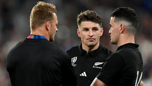 PARIS, FRANCE - SEPTEMBER 08: Sam Cane, Beauden Barrett and Will Jordan of New Zealand look dejected at full-time following the Rugby World Cup France 2023 Pool A match between France and New Zealand at Stade de France on September 08, 2023 in Paris, France. (Photo by Hannah Peters/Getty Images)