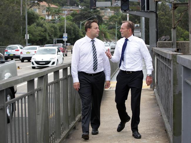 Warringah MP Tony Abbott and Mackellar MP Jason Falinski yesterday called on the NSW government to announce its plans for a tunnel bypassing the Spit Bridge.