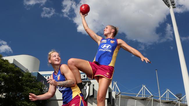 Lions players Nicole Hildebrand and Kaitlyn Ashmore want a Gabba final. Photo: Darren England.