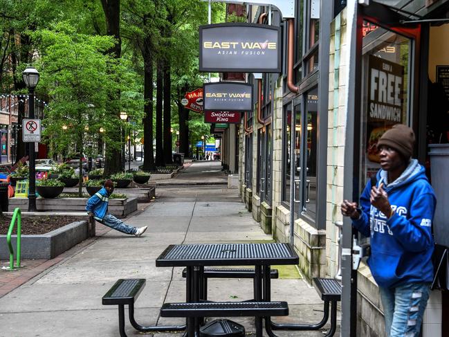 A homeless person comes out of a sandwich shop in downtown in Atlanta, Georgia. Picture: AFP