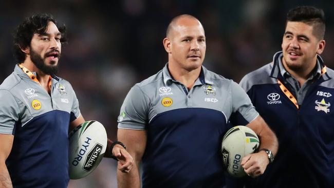 Injured Cowboys players Johnathan Thurston (L) and Matt Scott (R).