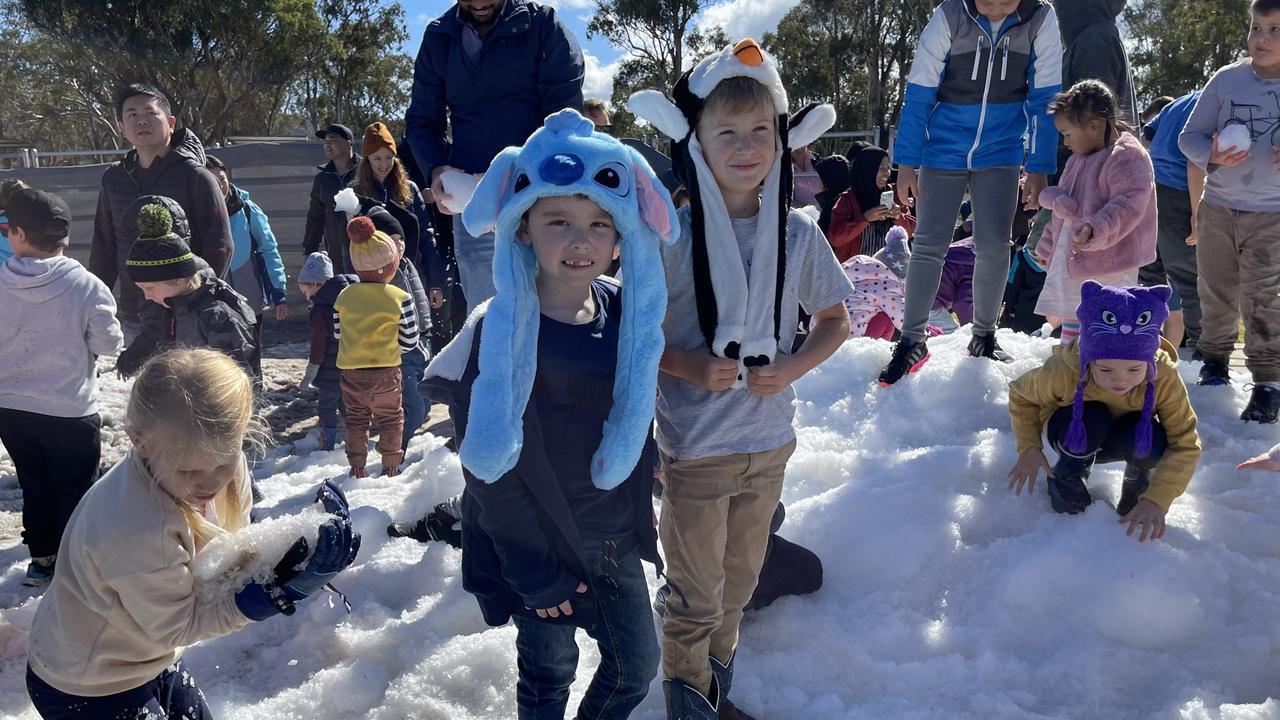 Felix Lubben (7) and Sam Dwan (7) from Warwick play in the snow at the Snowflakes in Stanthorpe 2021 festival. Photo: Madison Mifsud-Ure / Stanthorpe Border Post