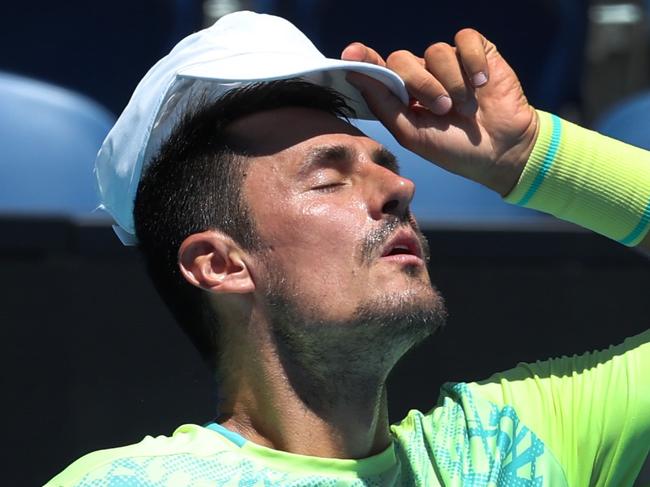 2025 Australian Open tennis. Bernard Tomic in action qualifying against Jozef Kovalik. Tomic feels the heat.                                   Picture: David Caird