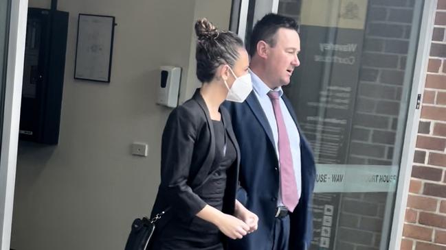 Kelly Borg (left) leaves Waverley Local Court after escaping conviction for drink driving