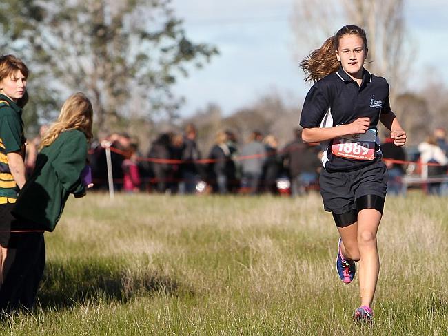 Ashya Rodman on her way to crossing the line first in the girls’ year 6 cross country.