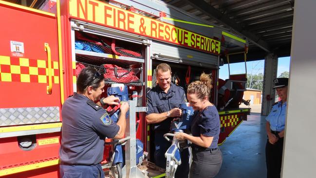 The Chief Minister was shown some of the firefighters’ tools. Picture: Darcy Fitzgerald