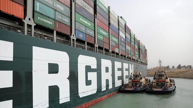 Too tough for tugs: The Evergreen remains stubbornly stuck. Picture: Suez Canal/AFP