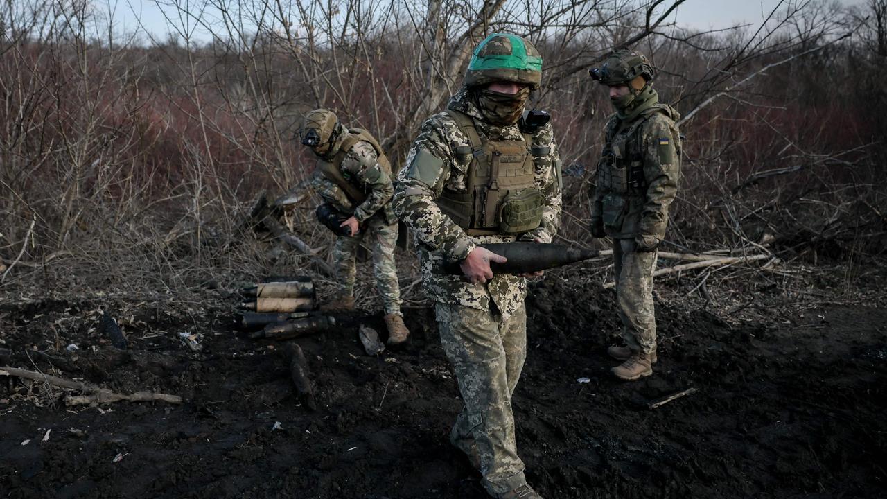 Ukrainian soldiers carrying shells in the Donetsk region last month. Picture: 24th Mechanized Brigade of Ukrainian Armed Forces/AFP