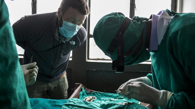 Joel Edgerton witnessing a trachoma surgery at a small health centre in rural Ethiopia. Picture: Michael Amendolia/Fred Hollows Foundation