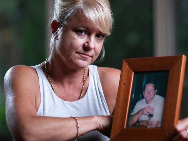 Shelley Boyd with a picture of her husband. Picture: Nigel Hallett