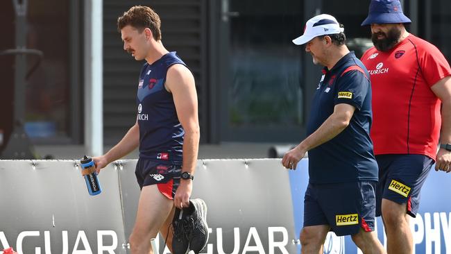 Lever makes his way off the ground after the unusual incident at Casey Fields. Picture: Getty Images