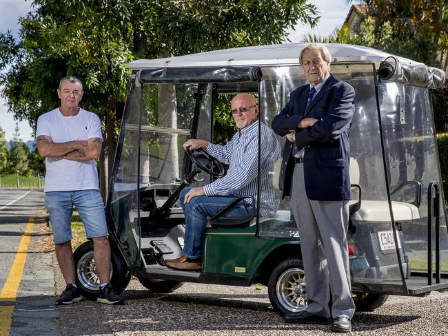 John Kirkland is petitioning for a public road to be opened for golf buggies after he copped a $313 fine for driving to the local shops. Stephen Moore (Cova Chairman), John Kirkland, and  Peter Howe (verandah at the pines chairperson body corp). Picture: Jerad Williams