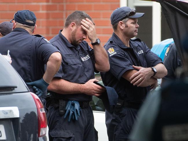 Police stand outside the Masjid Al Noor mosque in the aftermath of the attack. 