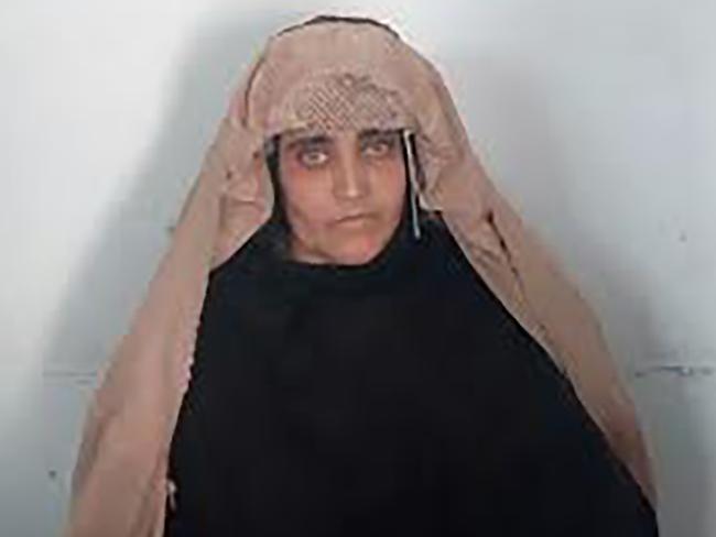 Sharbat Gula, the 'Afghan Girl', awaits her court hearing in Peshawar. Picture: AFP/FIA