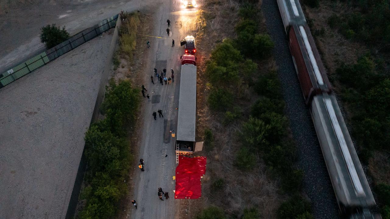 Members of law enforcement investigate the truck on June 27, 2022 in San Antonio, Texas. Picture: Jordan Vonderhaar/Getty Images/AFP